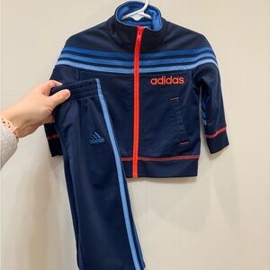 Adidas Dark Blue Tracksuit with Red and Light Blue Stripes